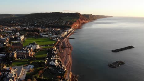 Aerial-shot-of-Sidmouth-and-Jurassic-Coast-in-Devon-England-on-a-beautiful-morning-at-sunrise