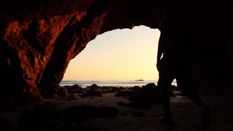 View-of-the-ocean-from-inside-a-sea-cave-at-Malibu-California,-El-matador-beach-during-golden-hour