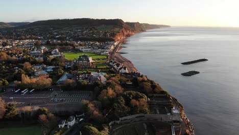 Drone-panorama-of-English-coastal-town-at-dusk-autumn-atmosphere