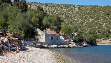Abandoned-Structure-On-the-Rugged-Shore-Of-Agia-Sofia-Beach-In-Kefalonia-Islands,-Greece