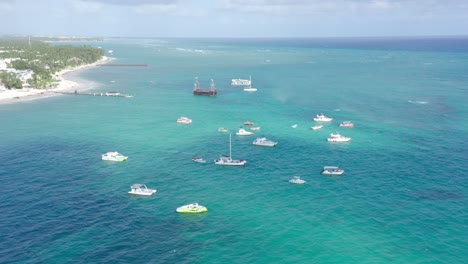 Boats-moored-at-Los-Corales-Beach-Village,-Punta-Cana-in-Dominican-Republic
