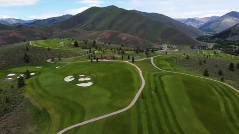 Aerial-drone-view-of-the-golf-course-in-between-the-valley-in-Sun-Valley-Idaho
