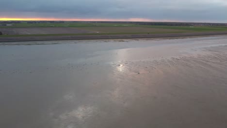 Aerial-Flying-Over-Texel-Beach-Mudflats-At-Texel-Island