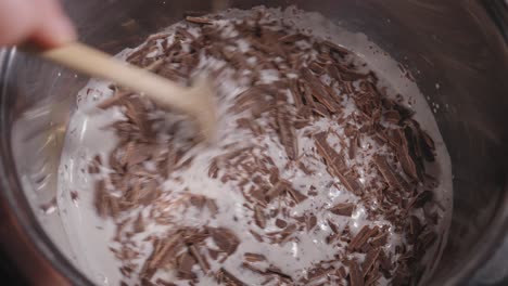 Mixing-Delicious-Dark-Chocolate-With-Coconut-Milk,-Baking-a-Yummy-Chocolate-Oat-Cake---Steady-Shot