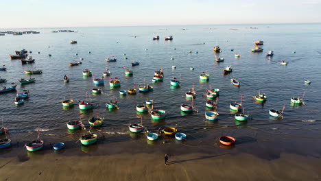 Round-basket-boats-used-by-locals-to-fish-along-coastline,-South-Vietnam