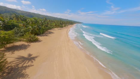 Drone-flying-over-Coson-beach,-Las-Terrenas-in-Dominican-Republic