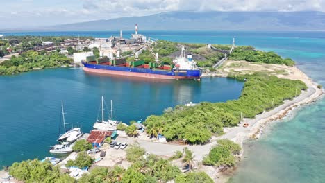 Bulk-carrier-docked-at-Barahona-port-unloads-coal-with-cranes