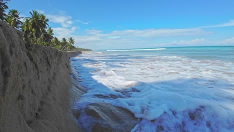 Foamy-Sea-Waves-Washing-Sandy-Beach-At-Playa-Coson-In-Las-Terrenas,-Dominican-Republic---slow-motion