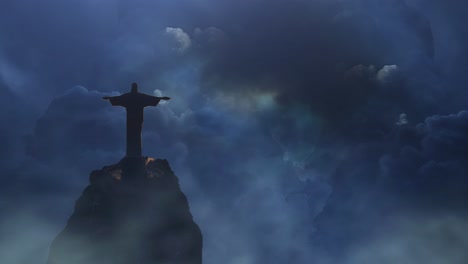 jesus-statue-on-the-mountain-with-thunderstorm-background