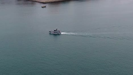 Peruvian-Coastguard-Patrol-Vessel-Navigating-Across-The-Callao-Harbor-In-Lima,-Peru