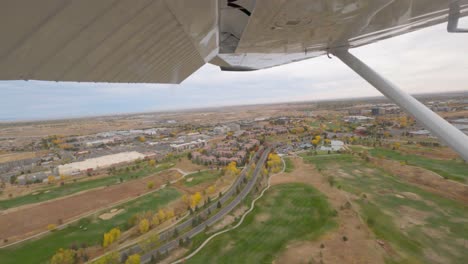 Looking-out-of-passenger-window-as-a-Cessna-182-lands-at-Colorado-Metro-airport