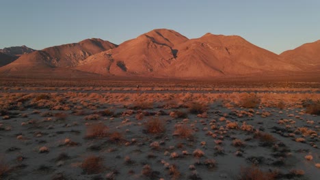 Aerial-view-of-desert-landscape-during-golden-hour-in-California