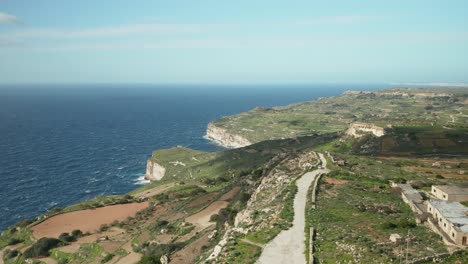 AERIAL:-Greeny-Landscape-in-Dingli-Cliffs-During-Winter-with-Blue-Sea-and-Sky