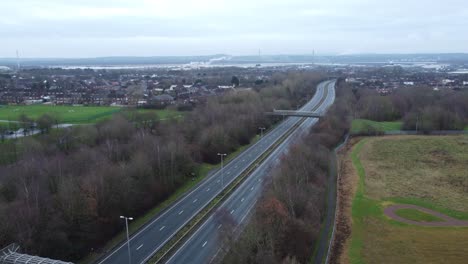 A557-Rainhill-Runcorn-Widnes-expressway-aerial-view-down-British-highway-orbit-wide-right