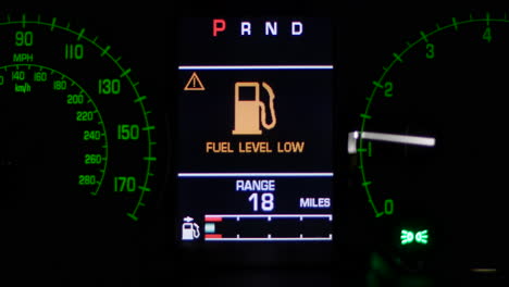 Low-Fuel-Level-Warning-Light-On-Car-Dashboard-Display