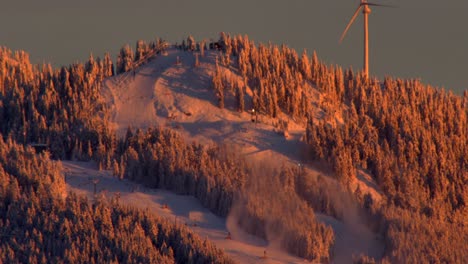 Static-close-up-shot-of-Grouse-Mountain-ski-slope,-people-skiing