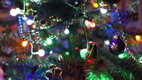 Push-out-rack-focus-on-beautifully-illuminated-Christmas-tree