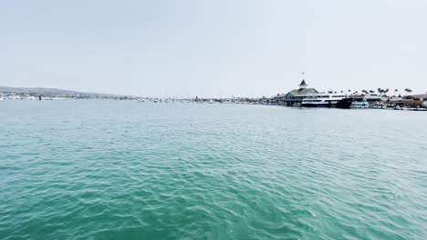Pan-across-the-harbor-at-Balboa-Island-from-the-ferry-making-its-way-back-to-Newport-Beach