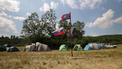 International-Scouting-Event-in-Slovakia,-Tents-and-Flag-at-Campsite,-Dolly