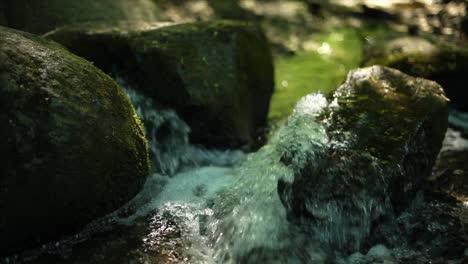 stream-water-hitting-rocks-in-slow-motion