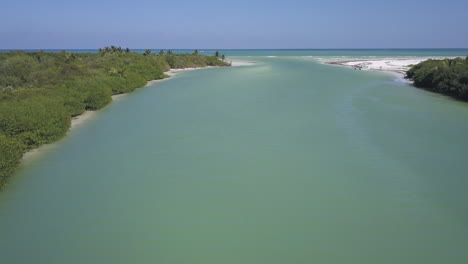 Low-aerial-flight-at-Sian-Ka'an-Reserve-inlet-to-Caribbean-Sea-beyond