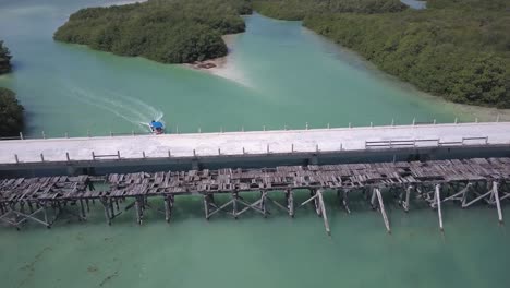 Old-and-new-Boca-Paila-bridges-cross-lagoon-inlet,-Sian-Ka'an-Reserve