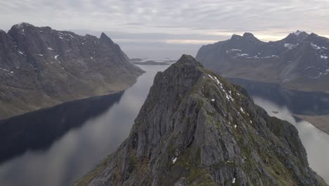 Aerial-drone-view-over-a-steep-mountain-ridge,-in-Lofotodden,-Lofoten,-Norway