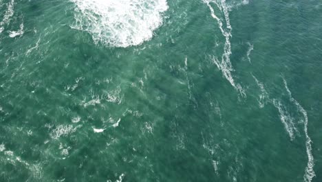 Aerial-overhead-view-of-low-tides-in-ocean