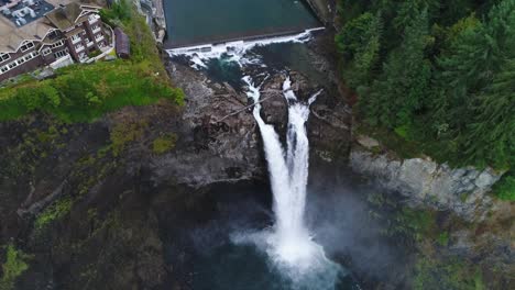 Aerial-that-transitions-from-looking-at-Snoqualmie-Falls-to-looking-down-at-the-waterfall