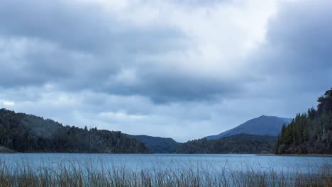 Time-lapse-of-a-cloudy-and-windy-afternoon,-between-mountains-from-Lago-Moreno,-Bariloche,-Argentina