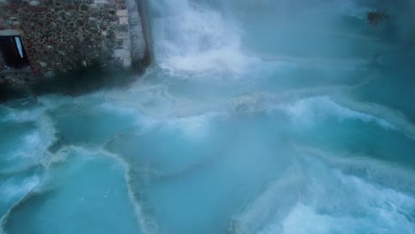 Famous-travel-destination-Saturnia,-geothermal-hot-springs-waterfall-bath-in-Tuscany-Italy-close-to-Siena-and-Grosseto