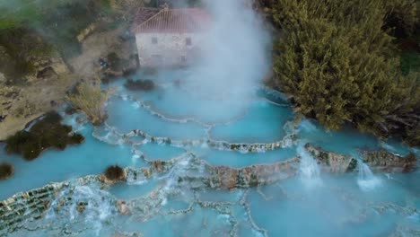 The-geothermal-hot-springs-bath-and-waterfall-at-Saturnia,-Tuscany-Italy-close-to-Siena-and-Grosseto