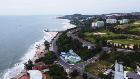 Coastal-drone-view-of-Sea-Links-Beach-Resort-and-Golf-in-Mui-Ne,-Vietnam