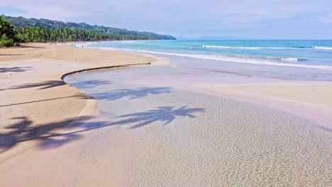 Large-stretch-of-pristine-tropical-beach,-Playa-Coson,-Las-Terrenas