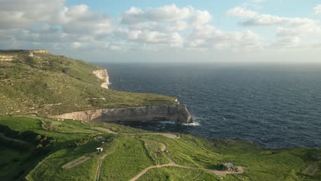 AERIAL:-Steep-Coastline-Shore-in-Malta-with-Roaring-Blue-Mediterranean-Sea