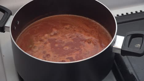 Salsa-roja-boiling-on-a-pot
