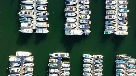 Top-down-aerial-view-of-yachts-and-boats-moored-in-a-marina-in-America