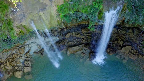 Scenic-Salto-Alto-waterfall-cascades-into-pool-below,-Bayaguana