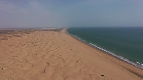 Aerial-Slow-Rising-Over-Empty-Beach-Coastline-At-Hingol-National-Park-In-Balochistan