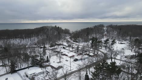 Aerial-truck-to-the-snow-covered-beaches-in-Muskegon-during-early-winter