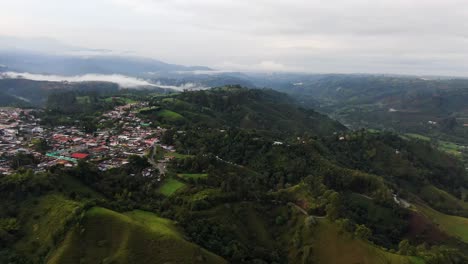 Lush-green-hillside-and-colorful-village-in-the-mountains-of-Colombia