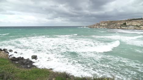Big-Mediterranean-Sea-Waves-Crashing-on-Shore-of-one-of-Malta's-Popular-Beaches