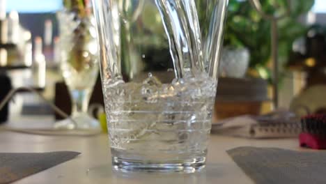 two-glasses-of-water-in-slowmotion