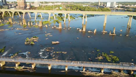 Pedestrian-Bridge-over-James-River-in-Richmond,-Virginia-|-Aerial-View-Panning-Across-|-Summer-2021