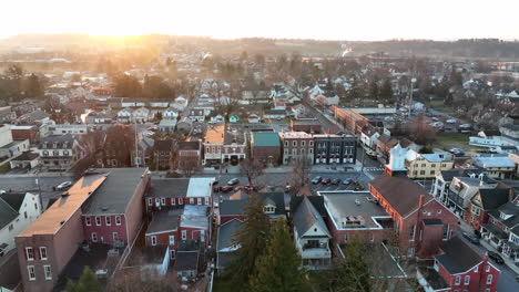 Beautiful-aerial-truck-shot-of-small-town-in-USA-at-sunrise