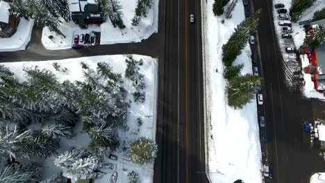 Aerial-of-a-highway-paved-through-a-ski-town