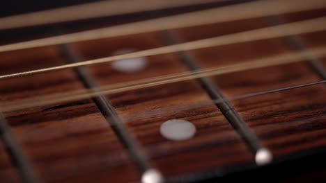 A-guitar-string-vibrates-in-slow-motion-after-being-plucked