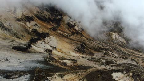 Steam-and-smoke-rises-from-a-volcano-in-the-Andes,-South-America