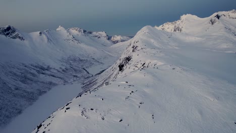 Slow-flight-over-Arctic-mountain-range-during-mid-winter
