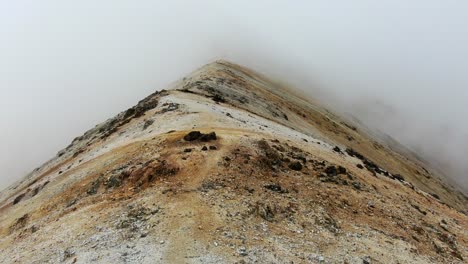 Drone-flying-over-a-mountain-ridge-in-clouds-in-the-Colombian-Andes